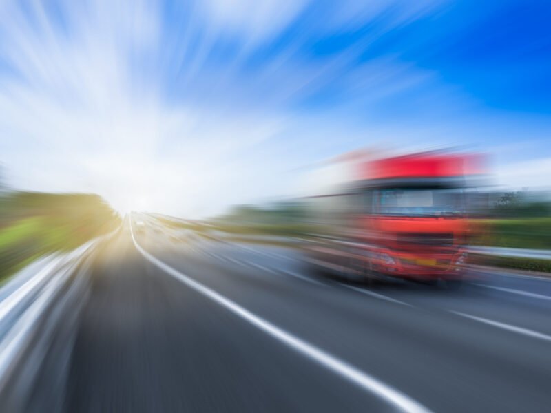 blur view of traffic on highway.